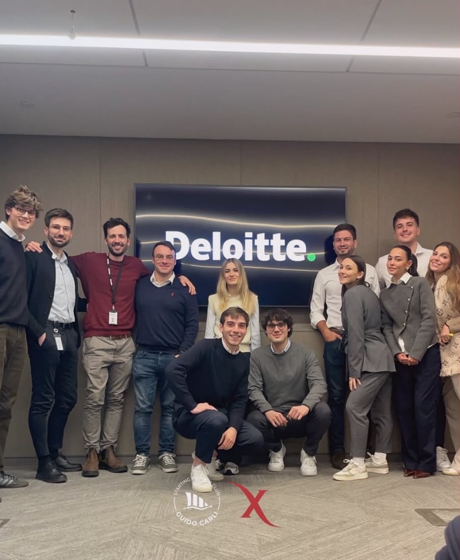 Members with the team at Deloitte, 30 Rockefeller Plaza